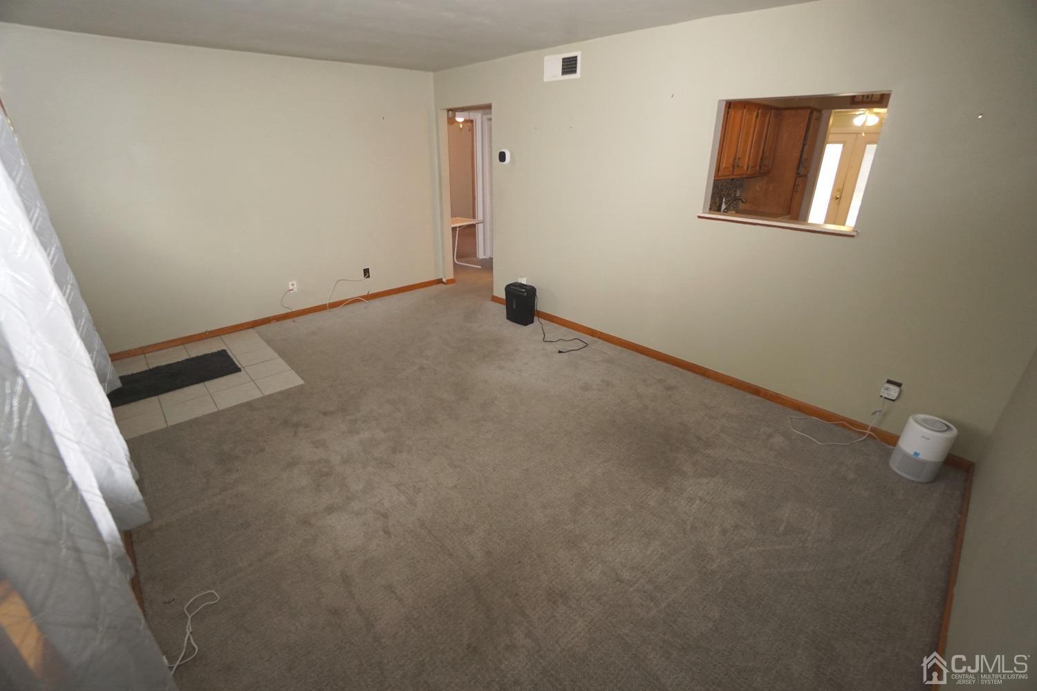 4 Piedmont Road Edison, NJ 08817 - Photo 6 of 22 an empty room with a window