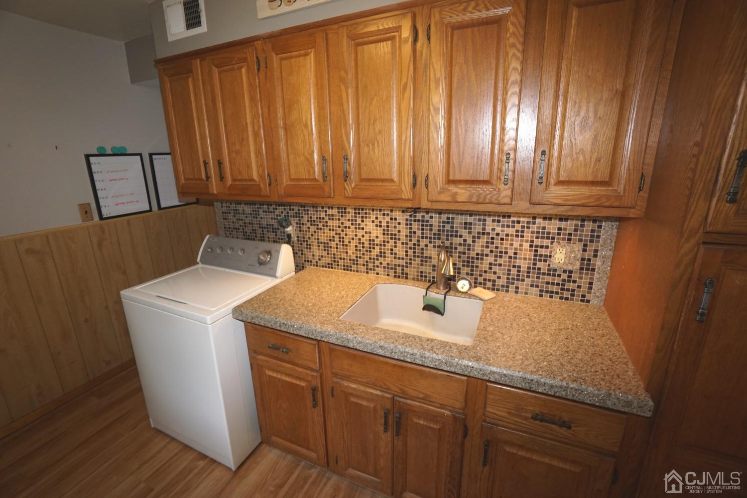 4 Piedmont Road Edison, NJ 08817 - Photo 10 of 22 a bathroom with a sink and cabinets