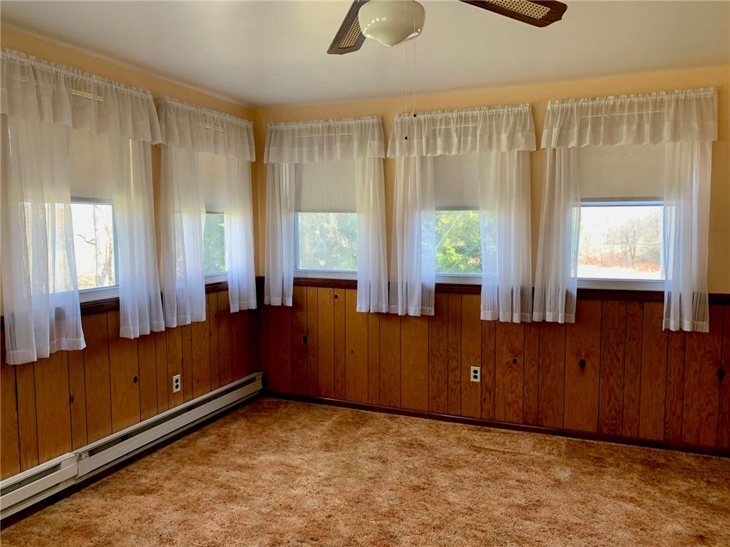 239 Crystal Spring Road Sandy Lake, PA 16145 - Photo 17 of 40 a view of an empty room with a window