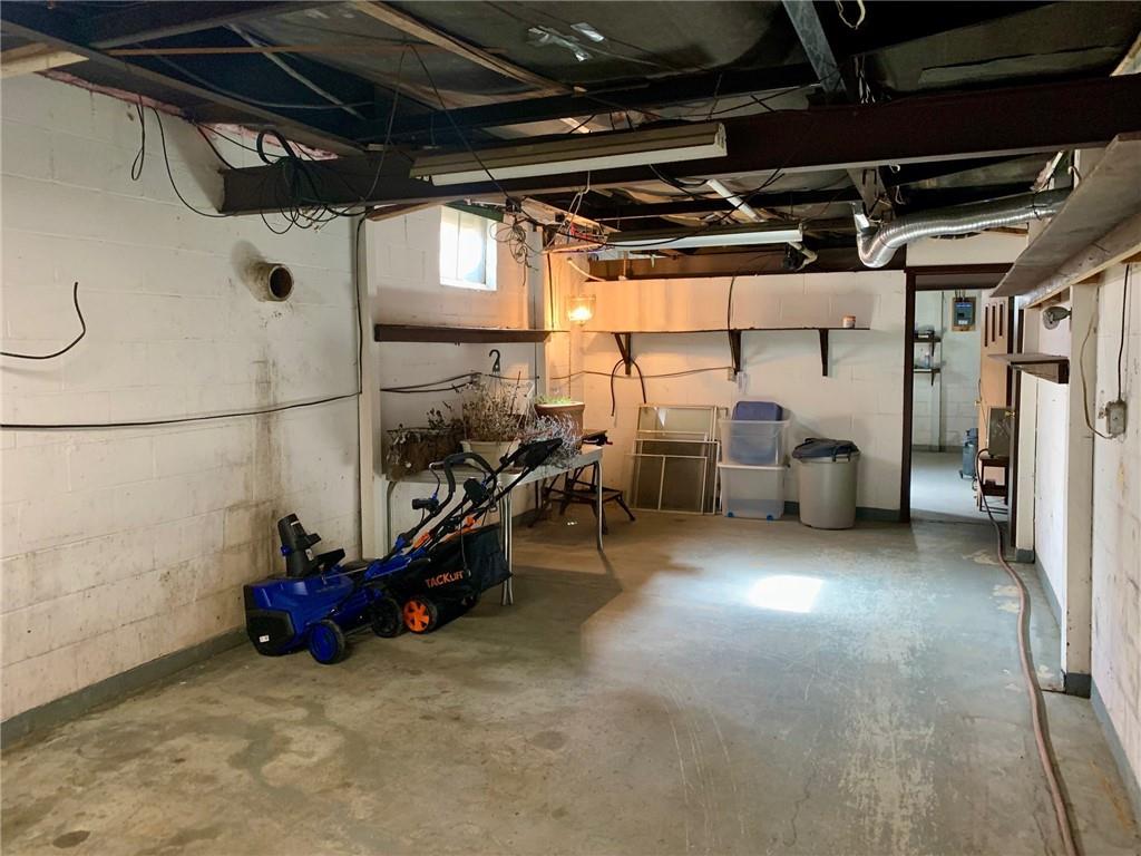 239 Crystal Spring Road Sandy Lake, PA 16145 - Photo 29 of 40 a view of a garage with storage