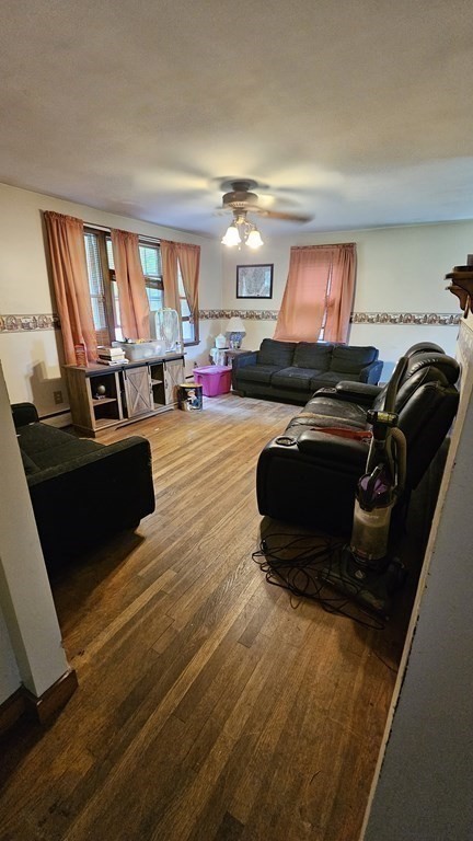 34 High Road Hardwick, MA 01031 - Photo 11 of 29 a living room with furniture and a flat screen tv