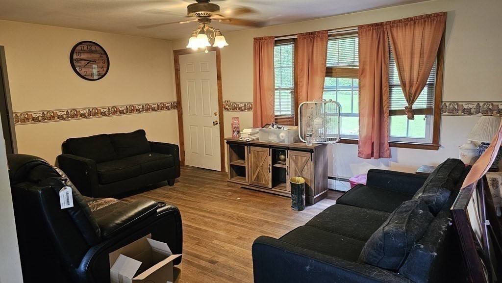 34 High Road Hardwick, MA 01031 - Photo 12 of 29 a living room with furniture and a large window