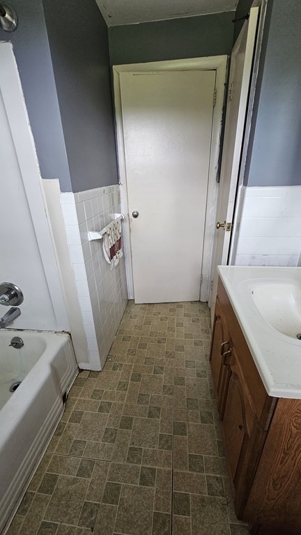 34 High Road Hardwick, MA 01031 - Photo 16 of 29 a bathroom with a sink and glass door shower