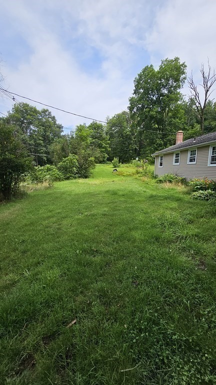34 High Road Hardwick, MA 01031 - Photo 23 of 29 a front view of a house with a yard