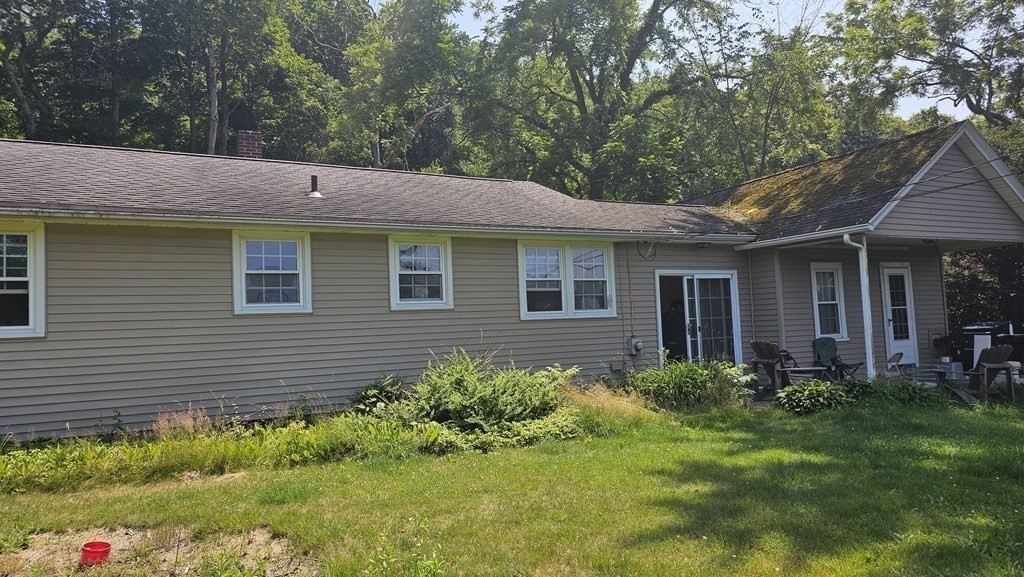 34 High Road Hardwick, MA 01031 - Photo 26 of 29 a front view of a house with a yard