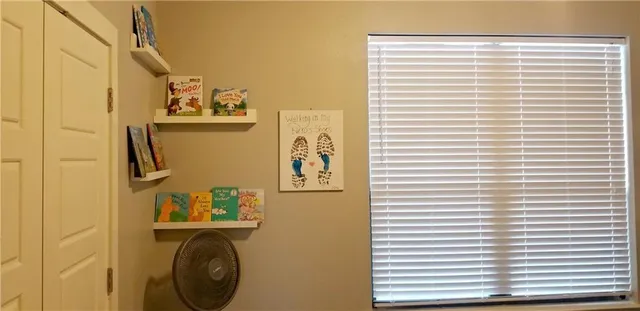 a view of washer and dryer in a bathroom