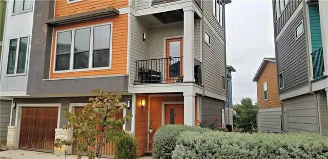 a front view of a multi story residential apartment building