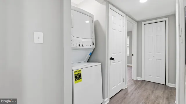 a view of bathroom with a sink and a mirror
