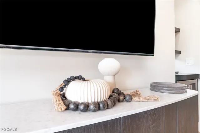 a vase of flowers sitting on a table
