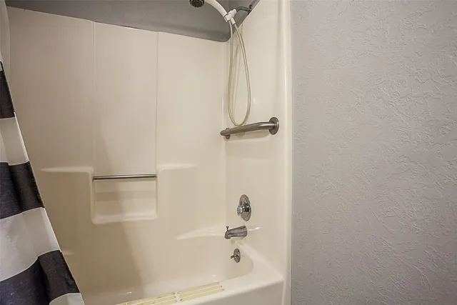 a bathroom with a tub