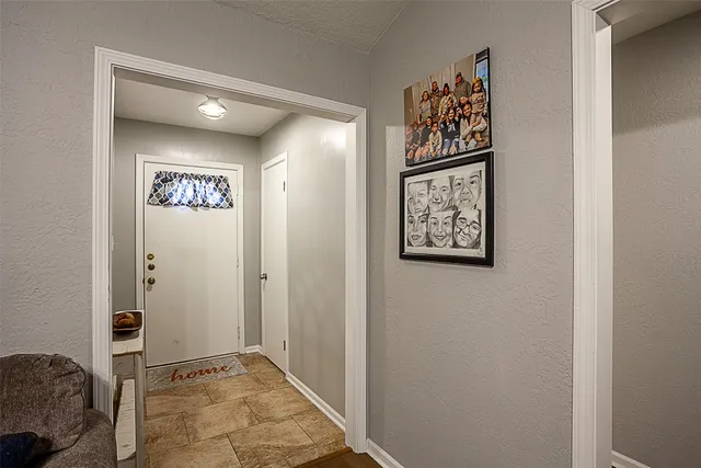 a view of a hallway with elevator
