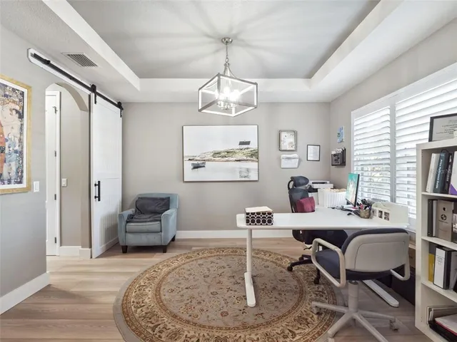 a living room with furniture and a couch