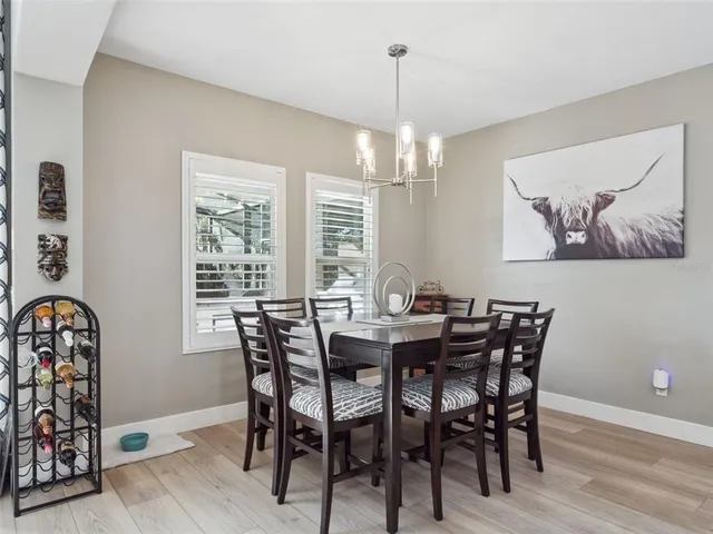 a stove top oven sitting inside of a kitchen
