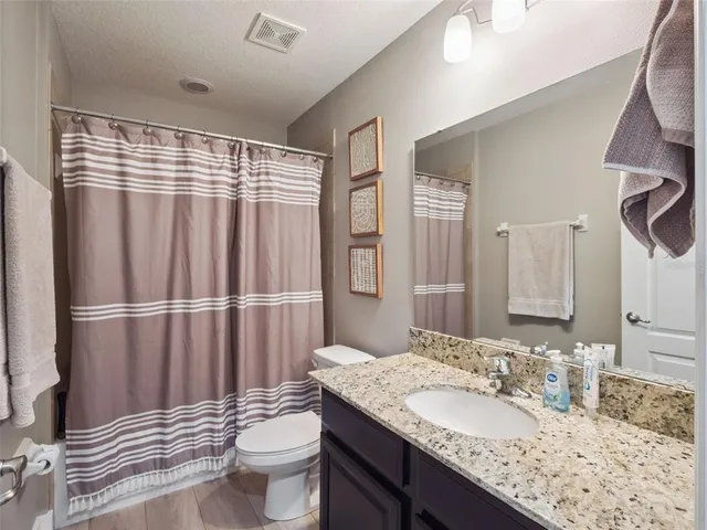 a hallway with a stove