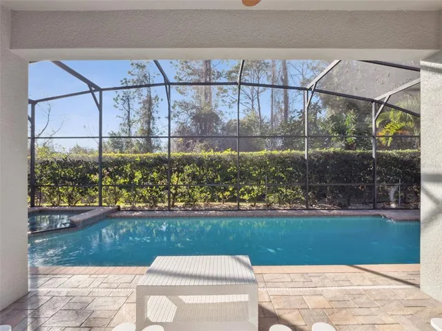 a view of a hallway view with wooden floor and staircase