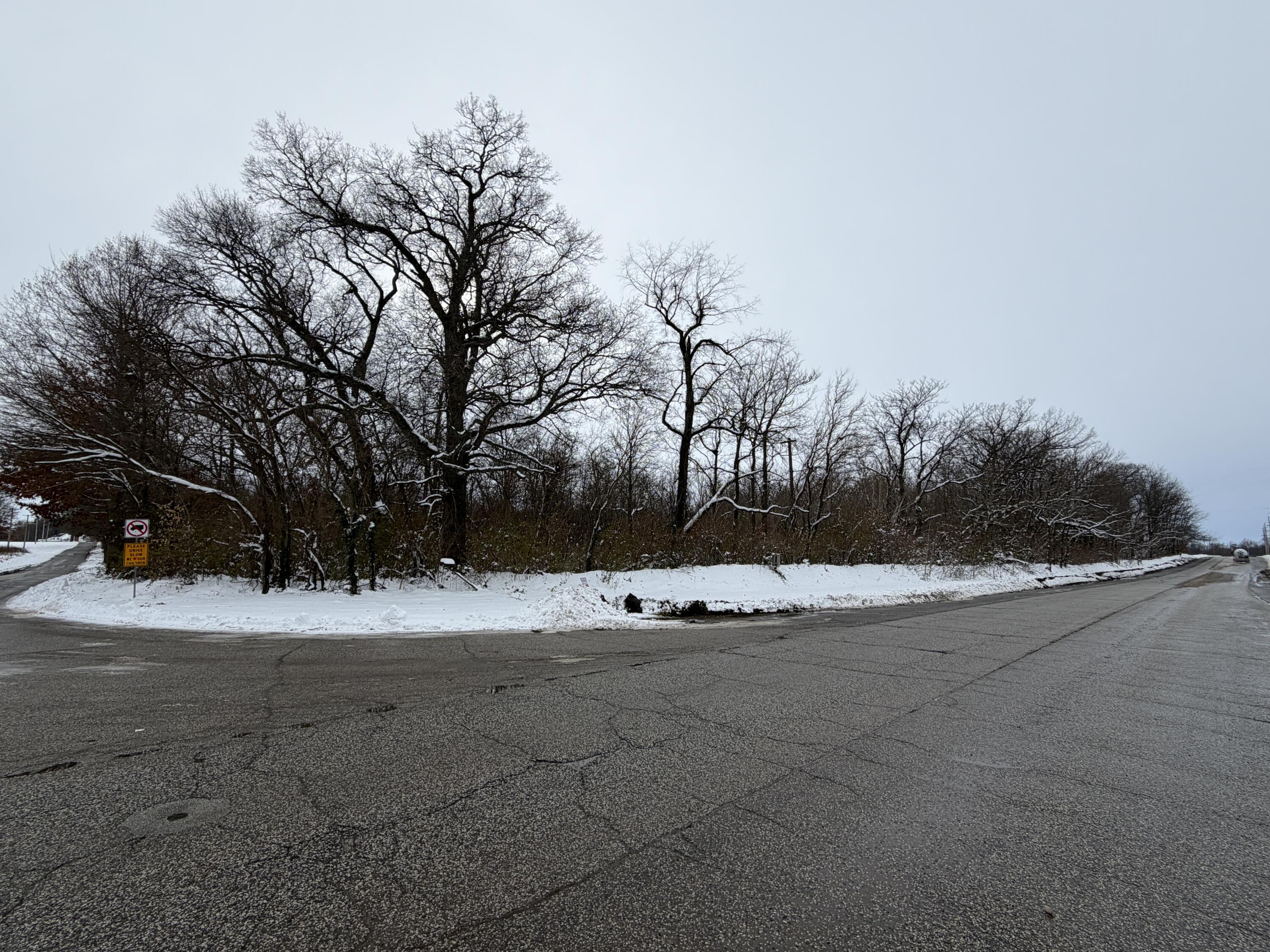 260 Hupp Road La Porte, IN 46350 - Photo 2 of 12 a view of a yard with a cars