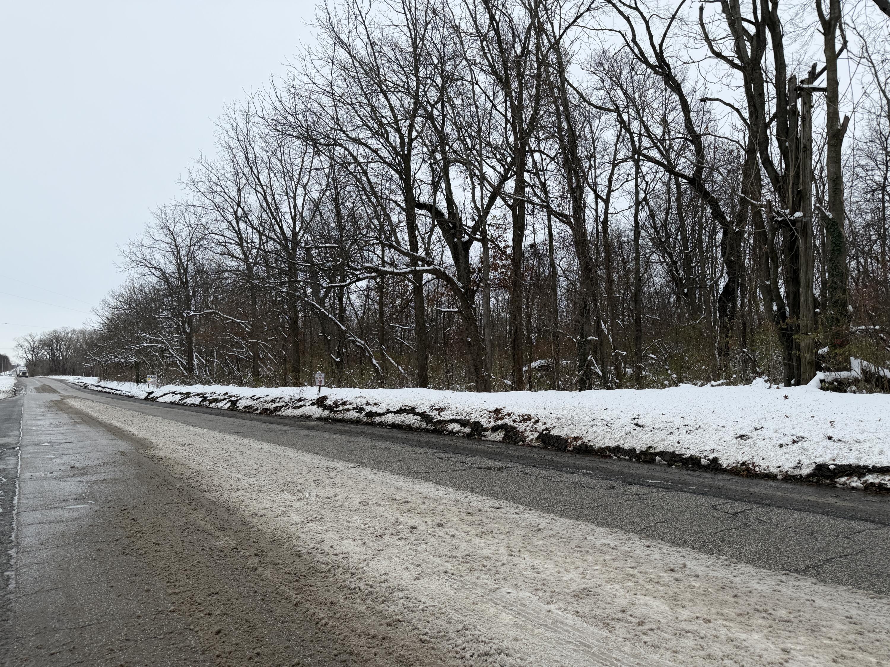 260 Hupp Road La Porte, IN 46350 - Photo 3 of 12 a view of a water covered with trees