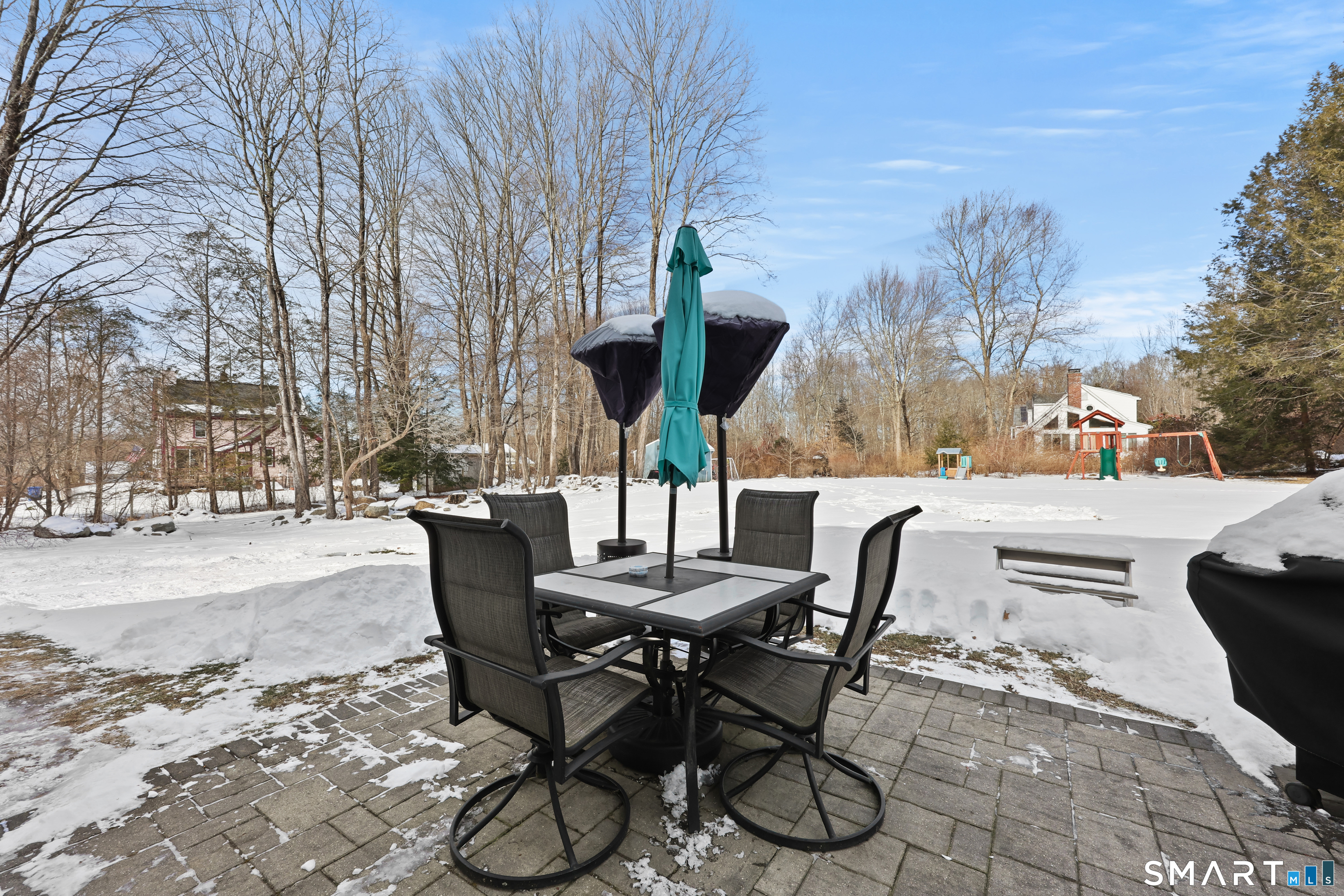 13 Basket Shop Road Hebron, CT 06248 - Photo 5 of 38 a view of a patio with a table and chairs