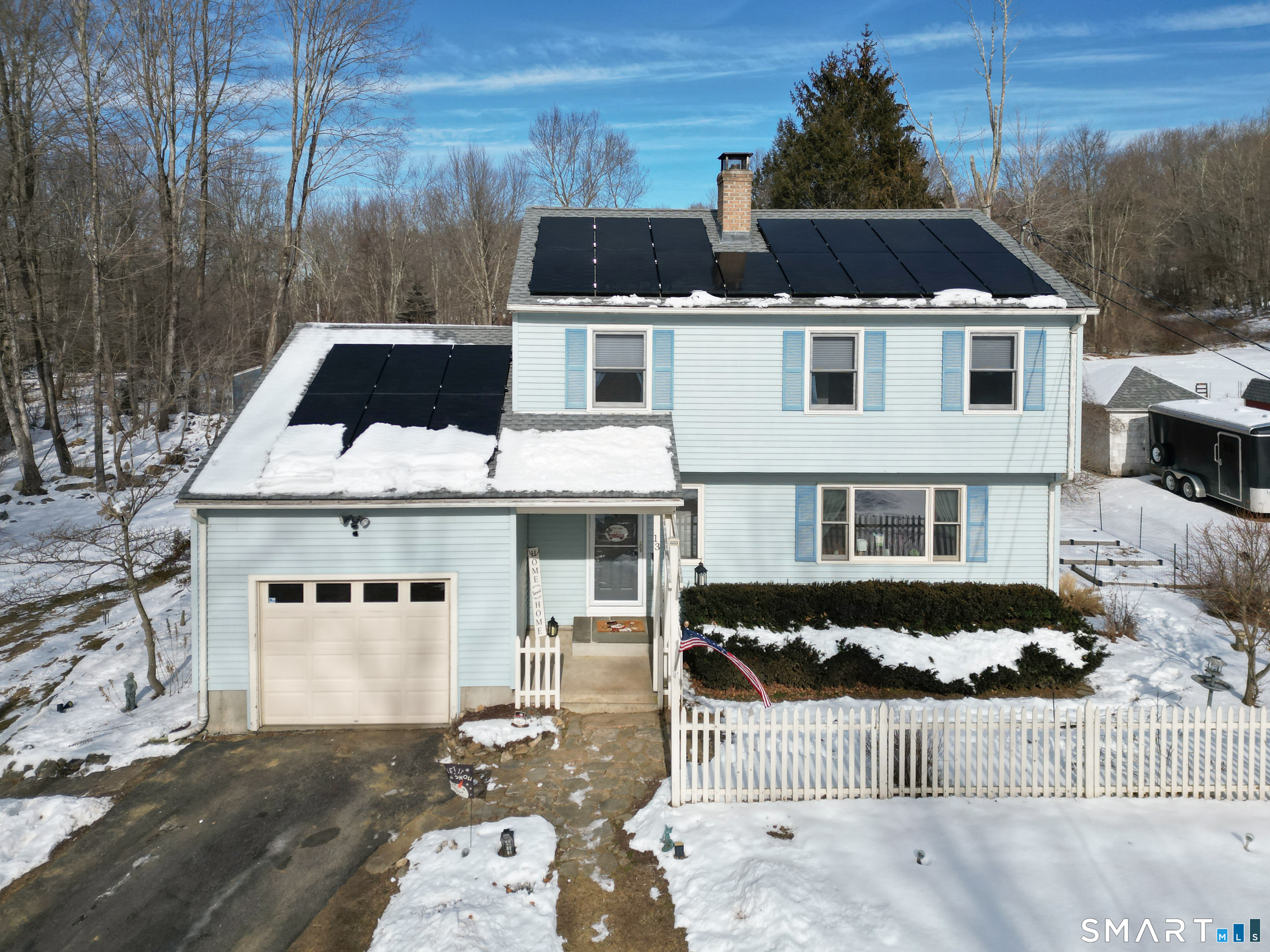 13 Basket Shop Road Hebron, CT 06248 - Photo 7 of 38 a front view of a house with a yard