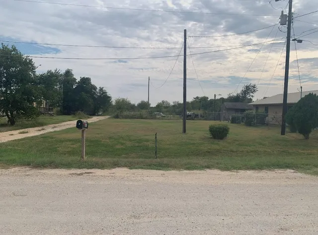 a house view with a lake