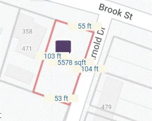 a picture of a book and a white bed