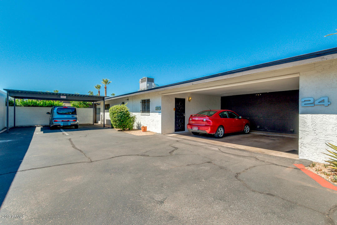 1250 East Bethany Home Road, Unit 24 Phoenix, AZ 85014 - Photo 18 of 19 a view of a car garage