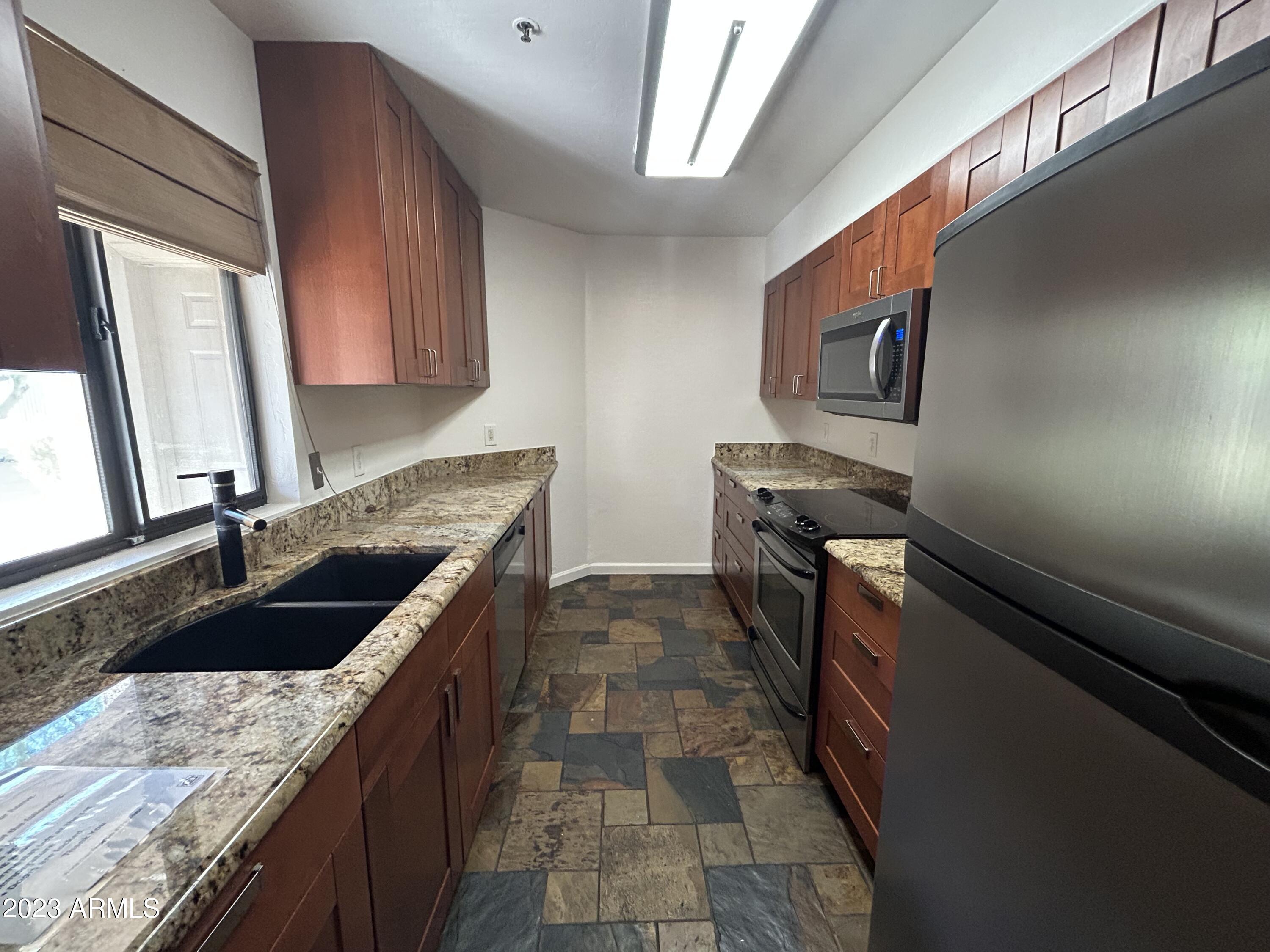 1287 North Alma School Road, Unit 165 Chandler, AZ 85224 - Photo 2 of 18 IMG_5525