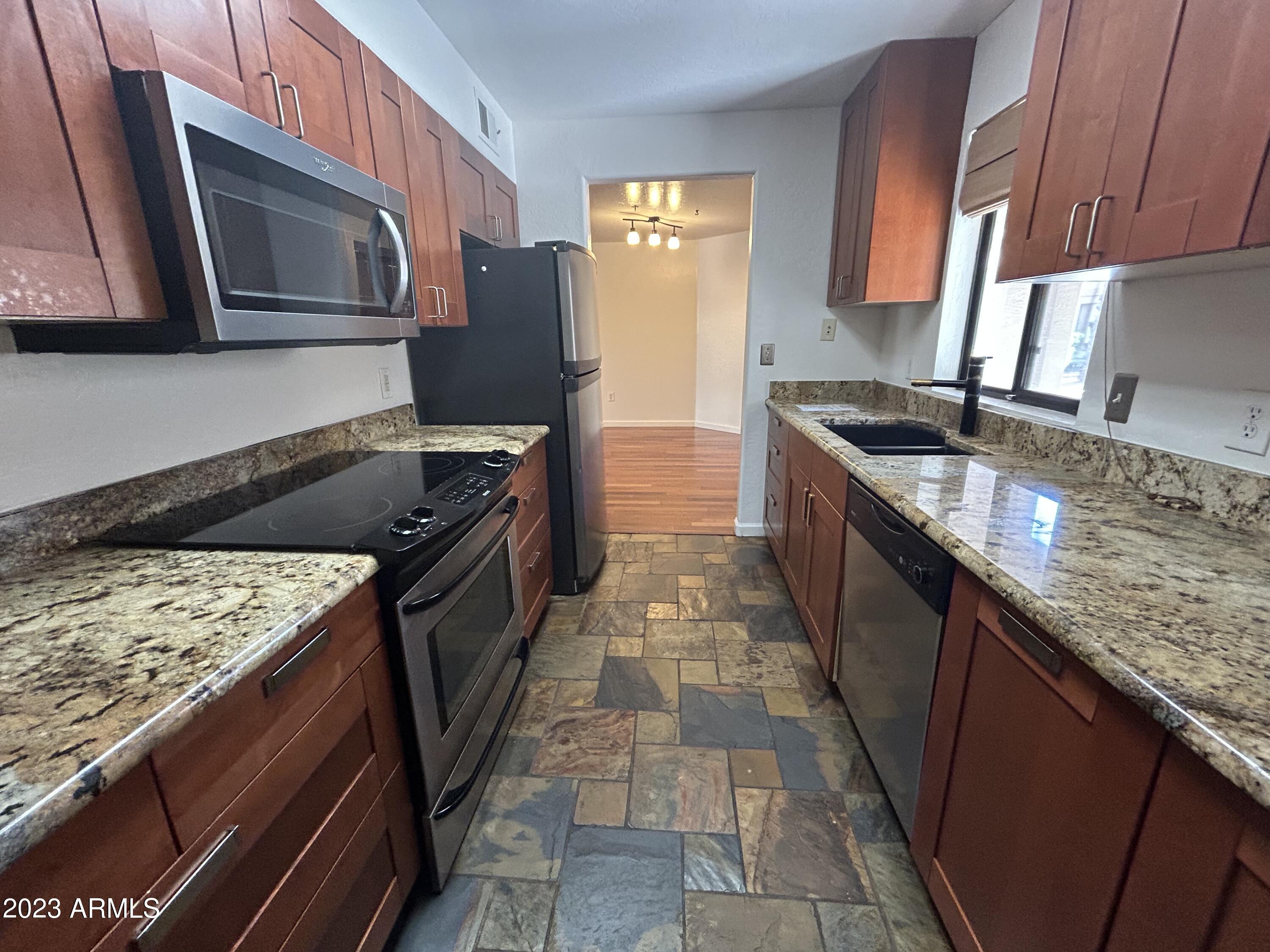 1287 North Alma School Road, Unit 165 Chandler, AZ 85224 - Photo 4 of 18 IMG_5527