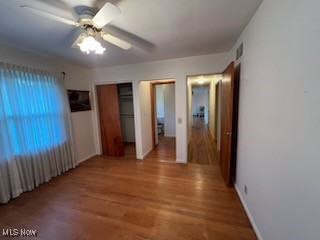 2375 Burnham Road Akron, OH 44333 - Photo 26 of 39 Living room featuring ceiling fan and hardwood flooring