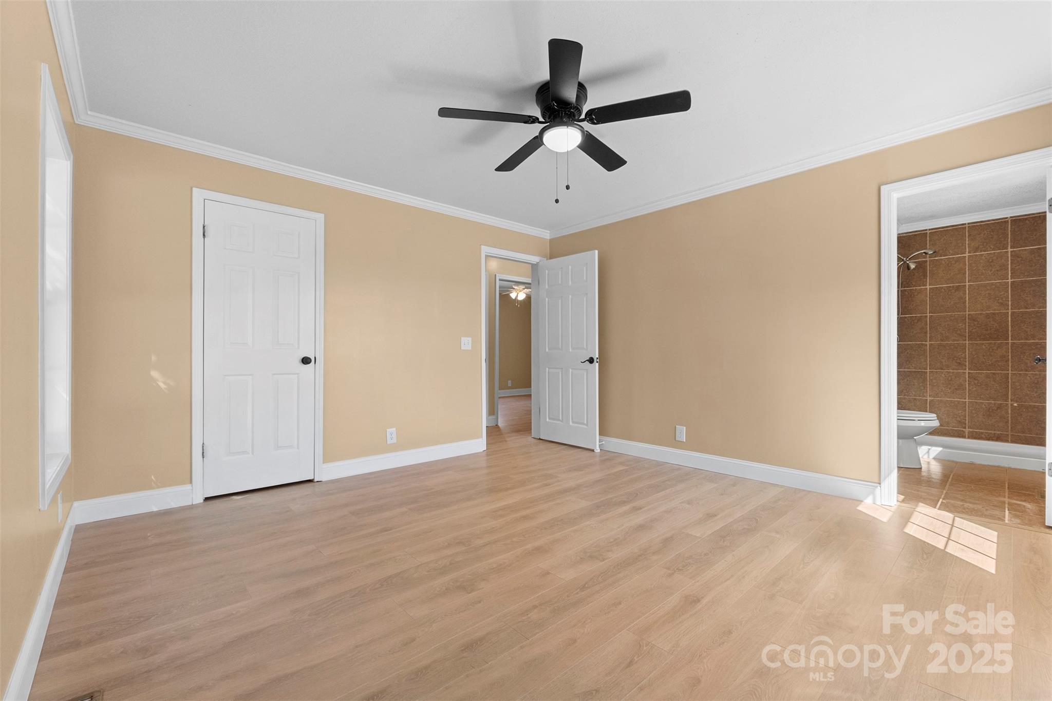 225 Lm Overcash Road Salisbury, NC 28146 - Photo 11 of 26 a view of a livingroom with a ceiling fan and window