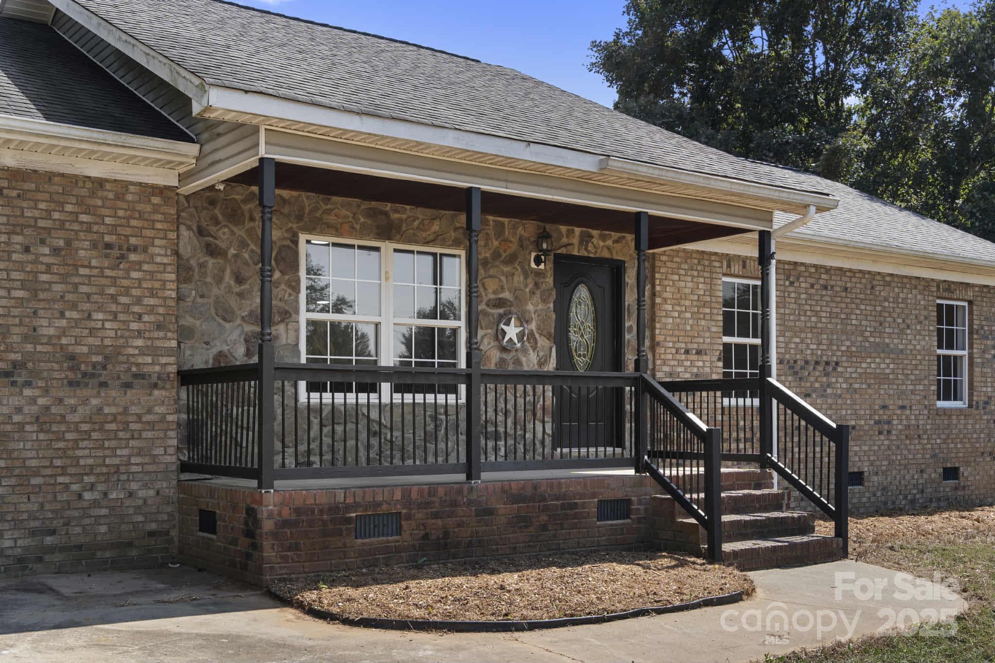 225 Lm Overcash Road Salisbury, NC 28146 - Photo 2 of 26 a view of a house with a wooden fence