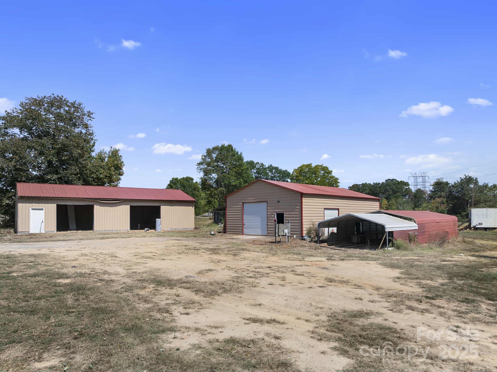 225 Lm Overcash Road Salisbury, NC 28146 - Photo 21 of 26 a large white house with a swimming pool in front of it