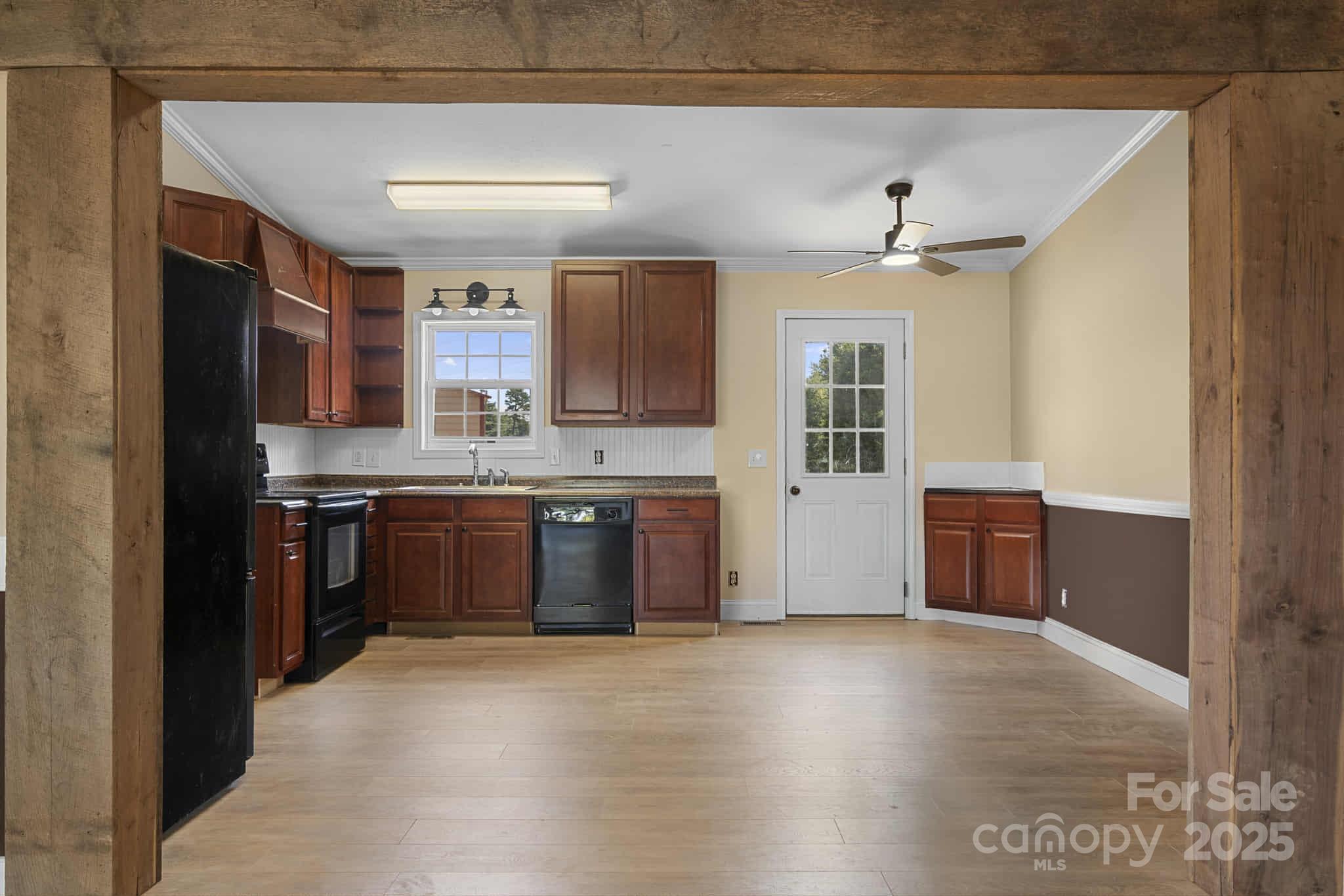 225 Lm Overcash Road Salisbury, NC 28146 - Photo 7 of 26 a kitchen with stainless steel appliances granite countertop a stove a sink and a refrigerator