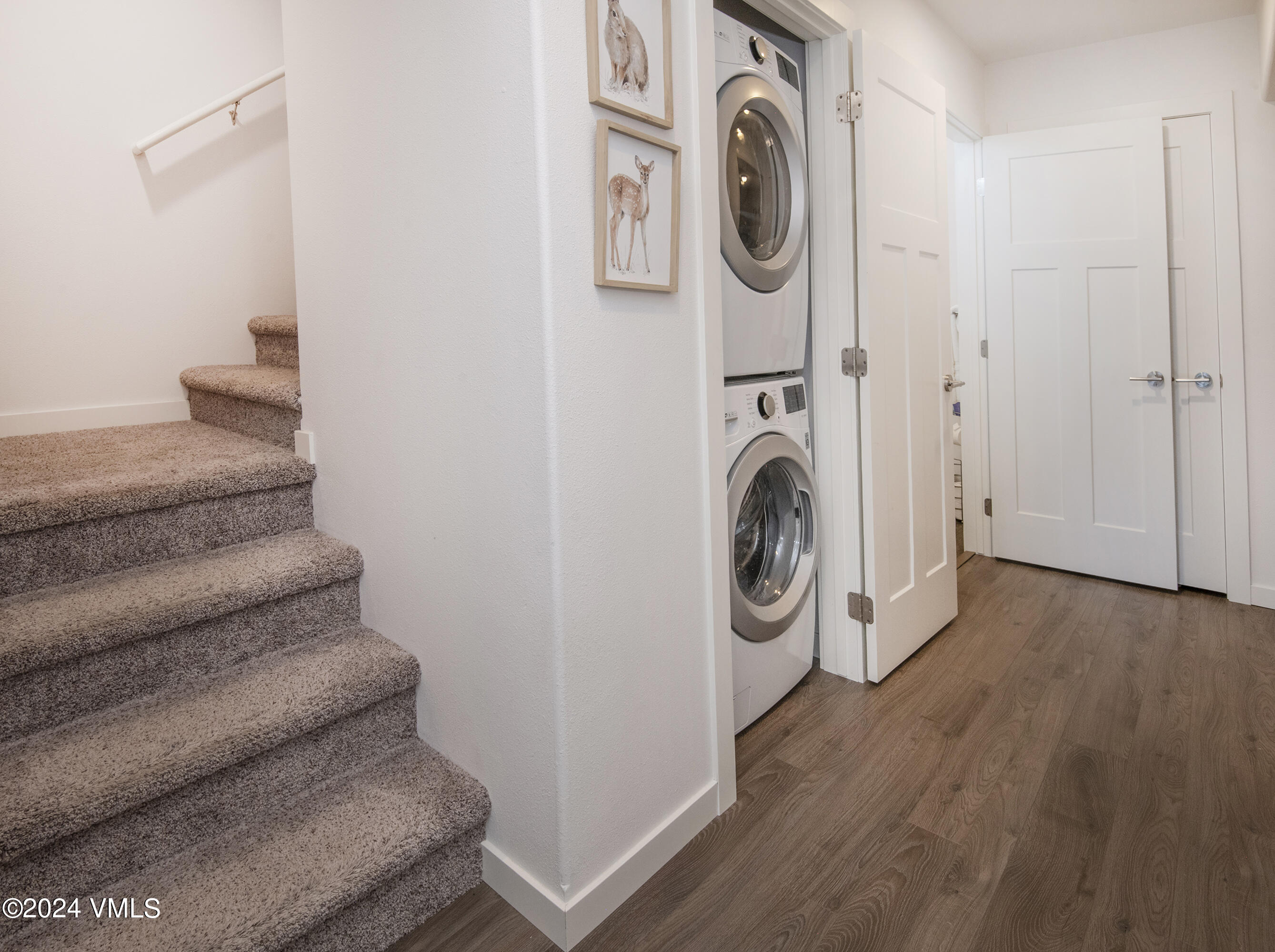 36 Eagle Landing Way Eagle, CO 81631 - Photo 16 of 36 a view of a hallway with washer and dryer