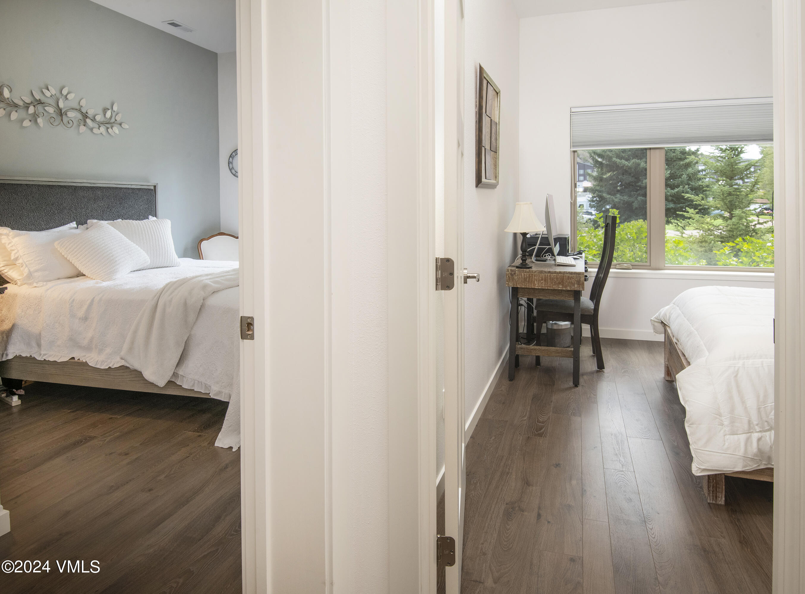 36 Eagle Landing Way Eagle, CO 81631 - Photo 17 of 36 a bedroom with a bed and a large window