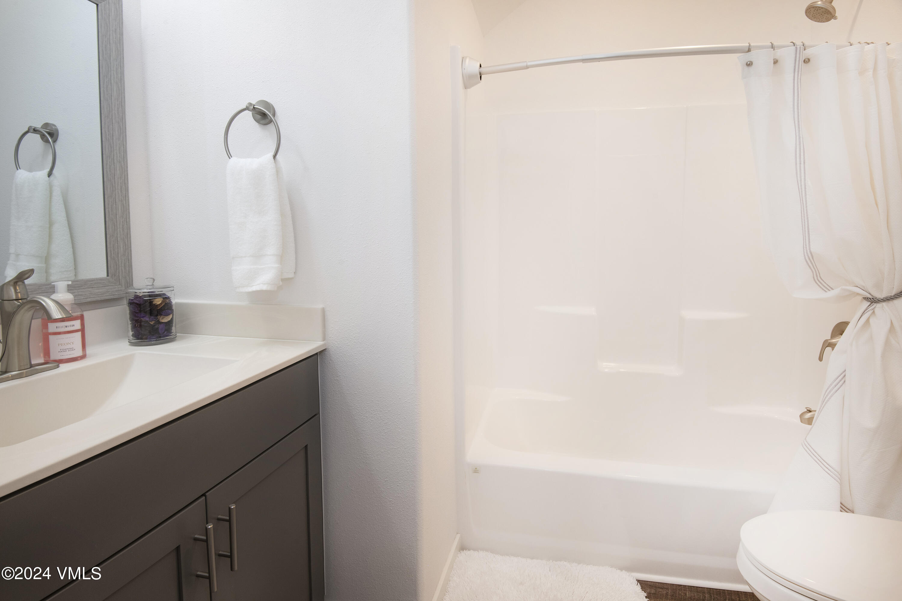 36 Eagle Landing Way Eagle, CO 81631 - Photo 27 of 36 a bathroom with a sink and a mirror