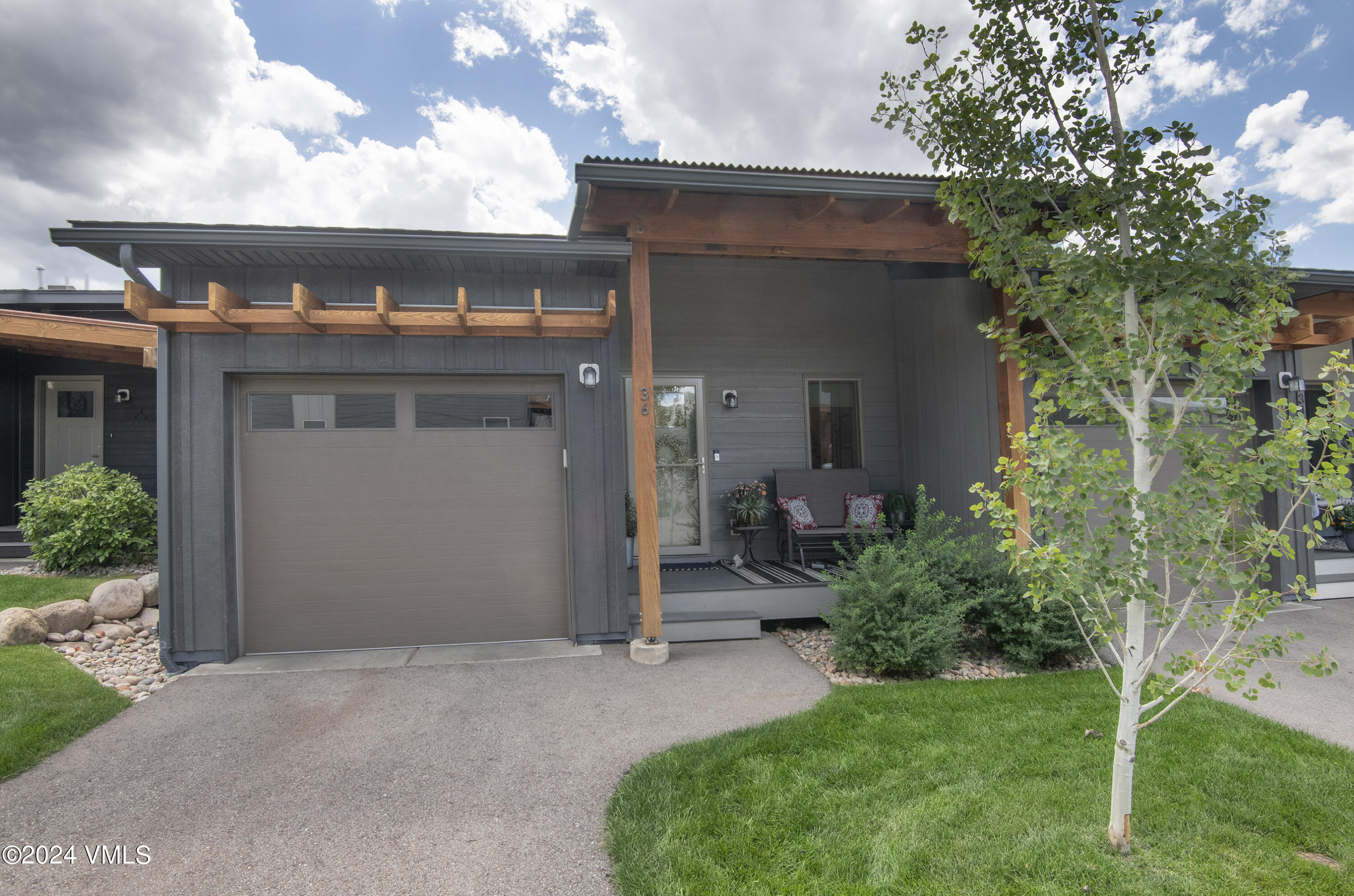 36 Eagle Landing Way Eagle, CO 81631 - Photo 32 of 36 a front view of a house with a yard