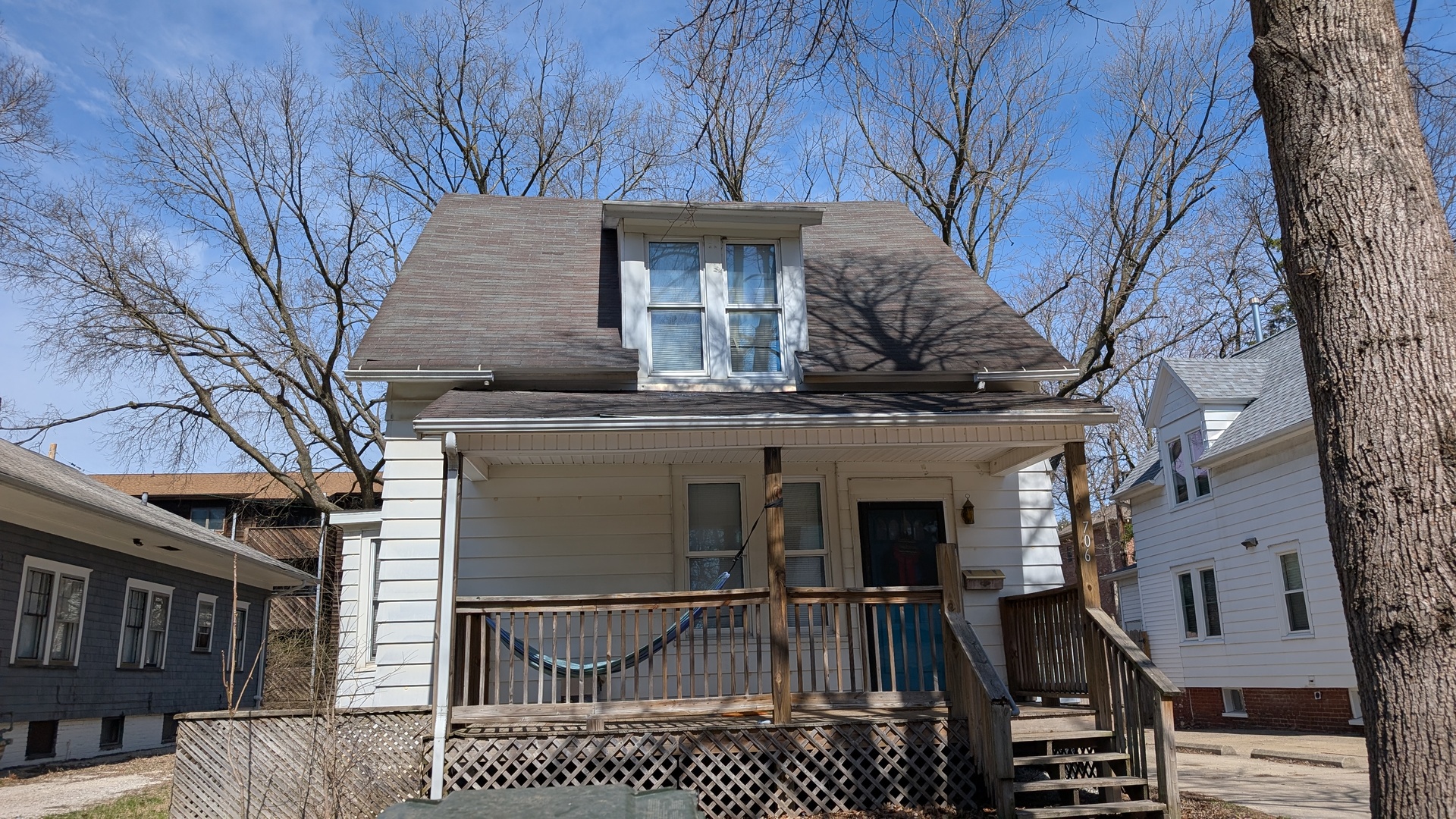 706 West High Street Urbana, IL 61801 - Photo 1 of 21 a view of a house with a large tree