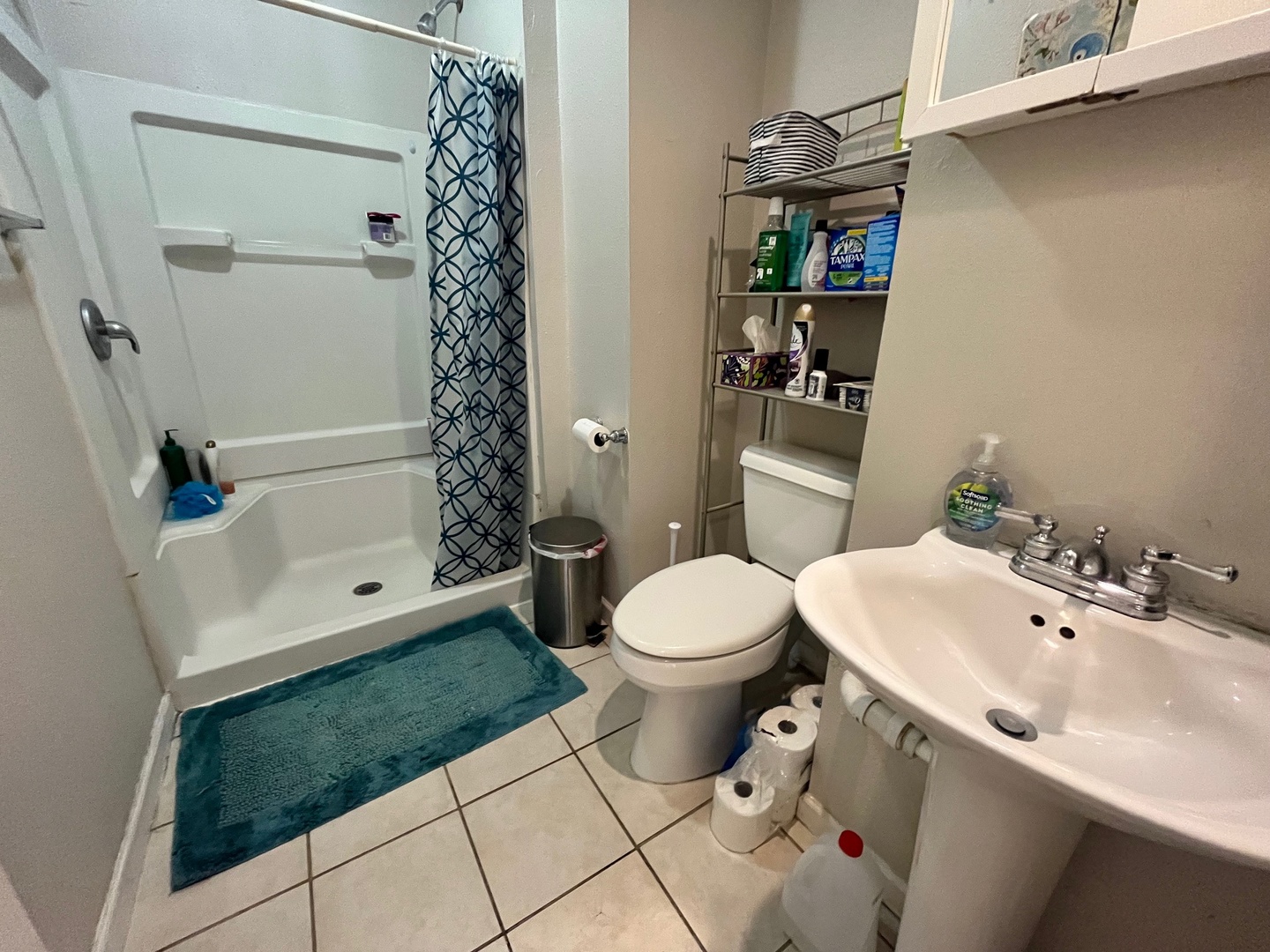 706 West High Street Urbana, IL 61801 - Photo 11 of 21 a bathroom with a sink toilet and shower