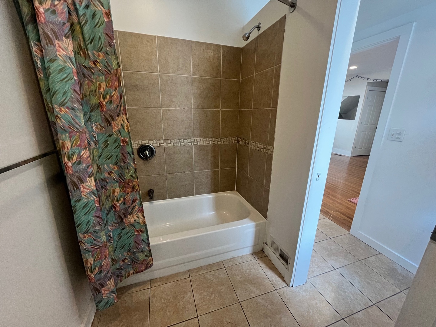 706 West High Street Urbana, IL 61801 - Photo 16 of 21 a bathroom with a bathtub and shower