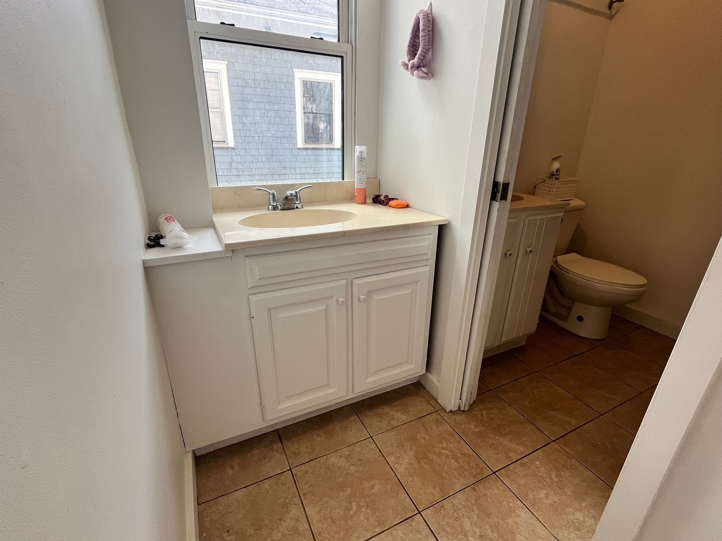 706 West High Street Urbana, IL 61801 - Photo 17 of 21 a bathroom with a sink toilet and mirror