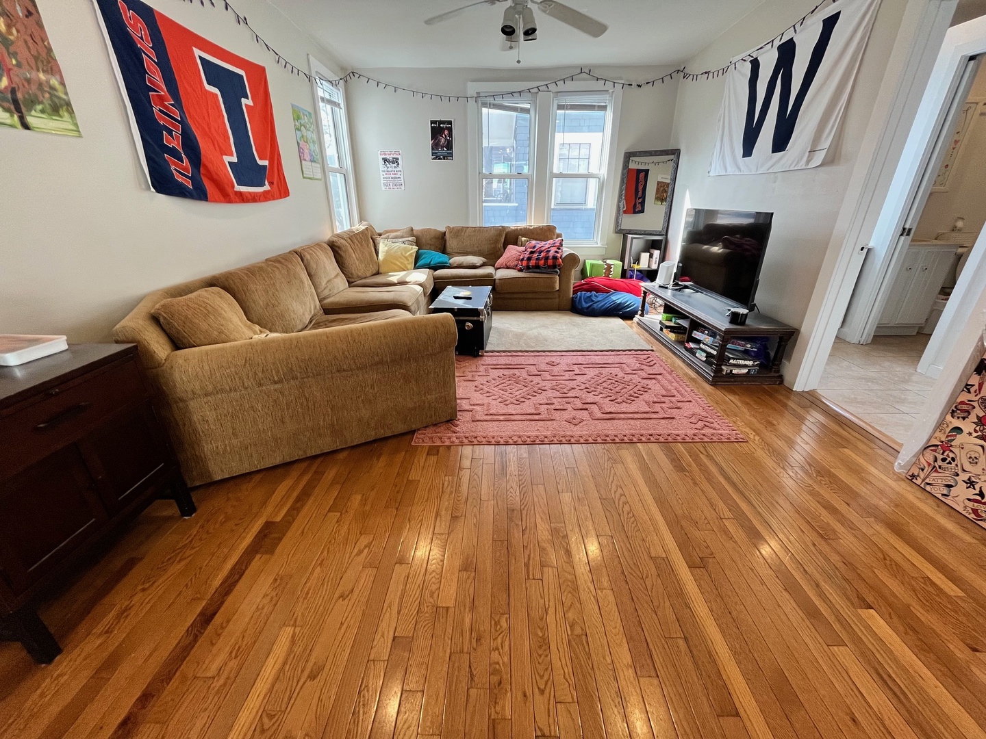 706 West High Street Urbana, IL 61801 - Photo 4 of 21 a living room with furniture and a flat screen tv