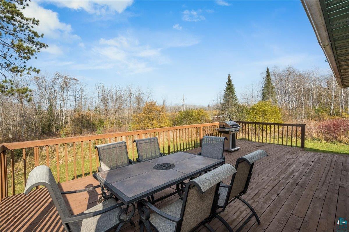 7702 East Rockmont Road Poplar, WI 54864 - Photo 19 of 22 Deck with area for grilling
