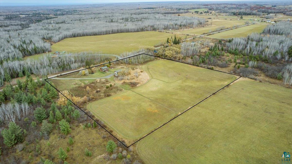 7702 East Rockmont Road Poplar, WI 54864 - Photo 21 of 22 Birds eye view of property with a rural view