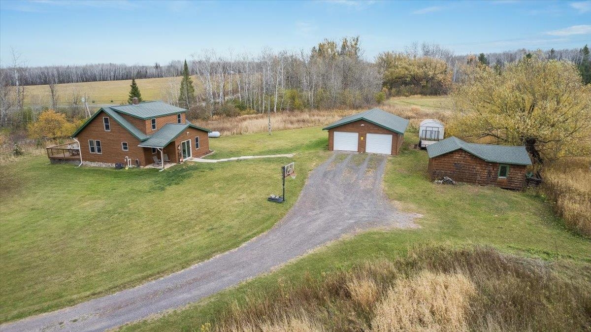 7702 East Rockmont Road Poplar, WI 54864 - Photo 3 of 22 Drone / aerial view with a rural view
