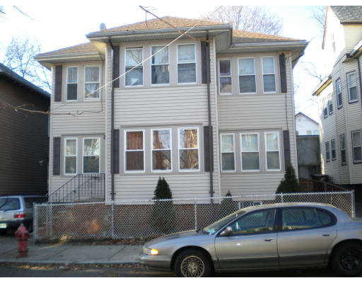 20 Chatham Road Everett, MA 02149 - Photo 4 of 4 a front view of a house with car parked