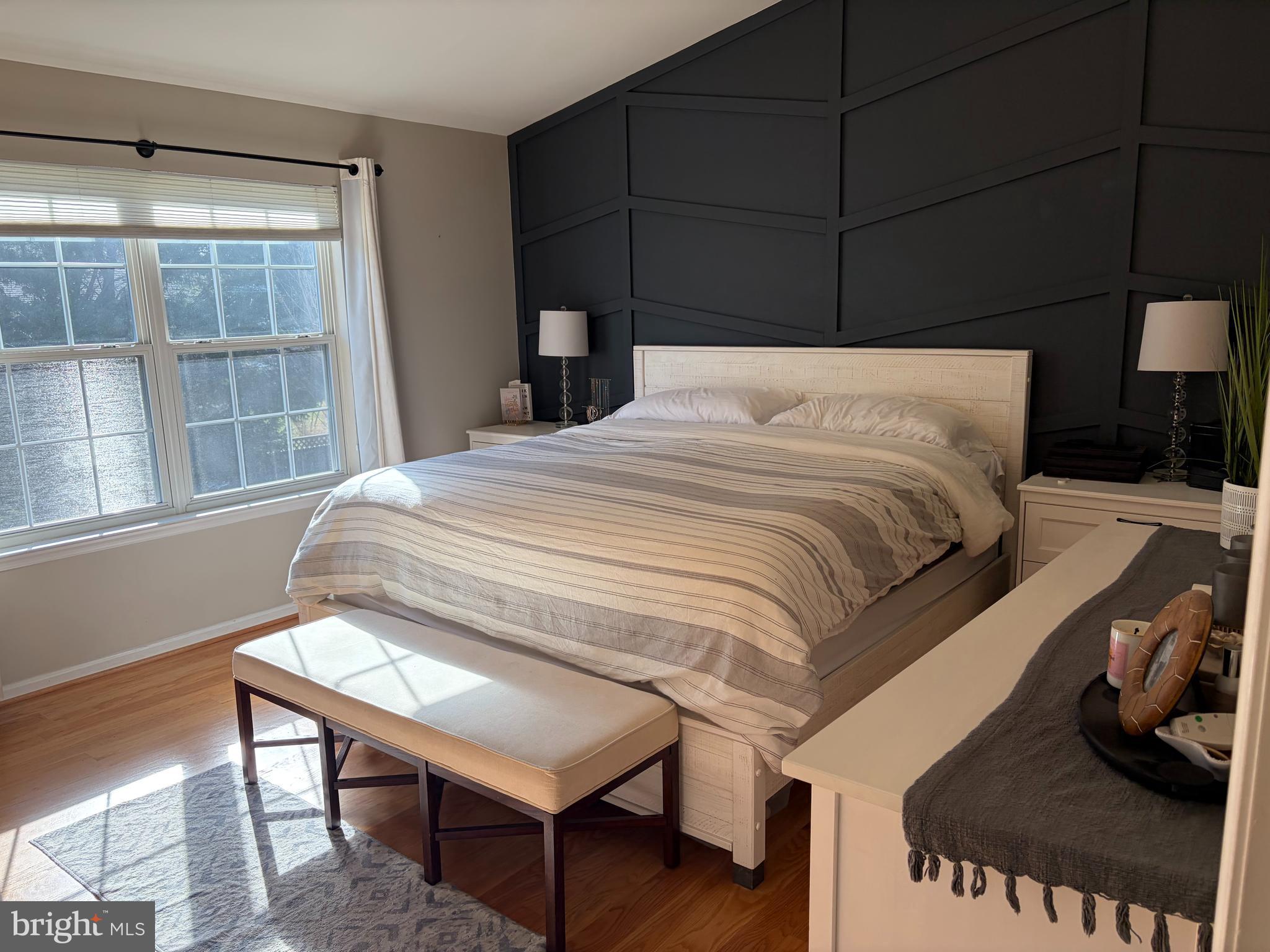 1545 Wakefield Road Edgewater, MD 21037 - Photo 5 of 9 a bedroom with a bed and a window