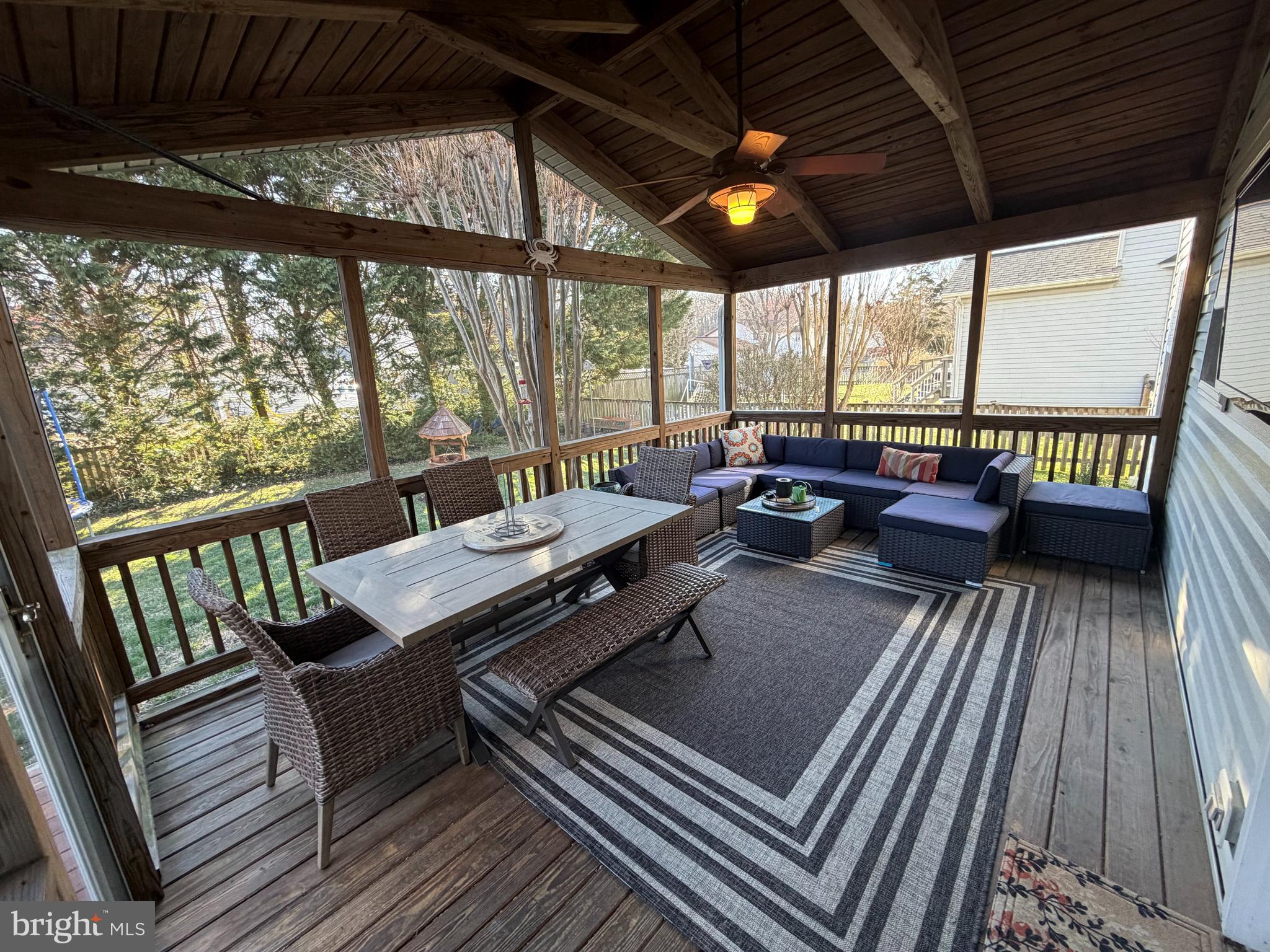 1545 Wakefield Road Edgewater, MD 21037 - Photo 6 of 9 a balcony with wooden floor and outdoor seating