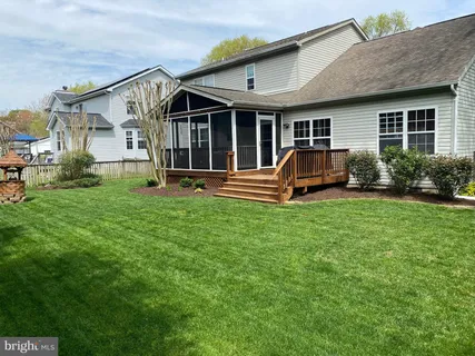 a front view of a house with a yard and yard