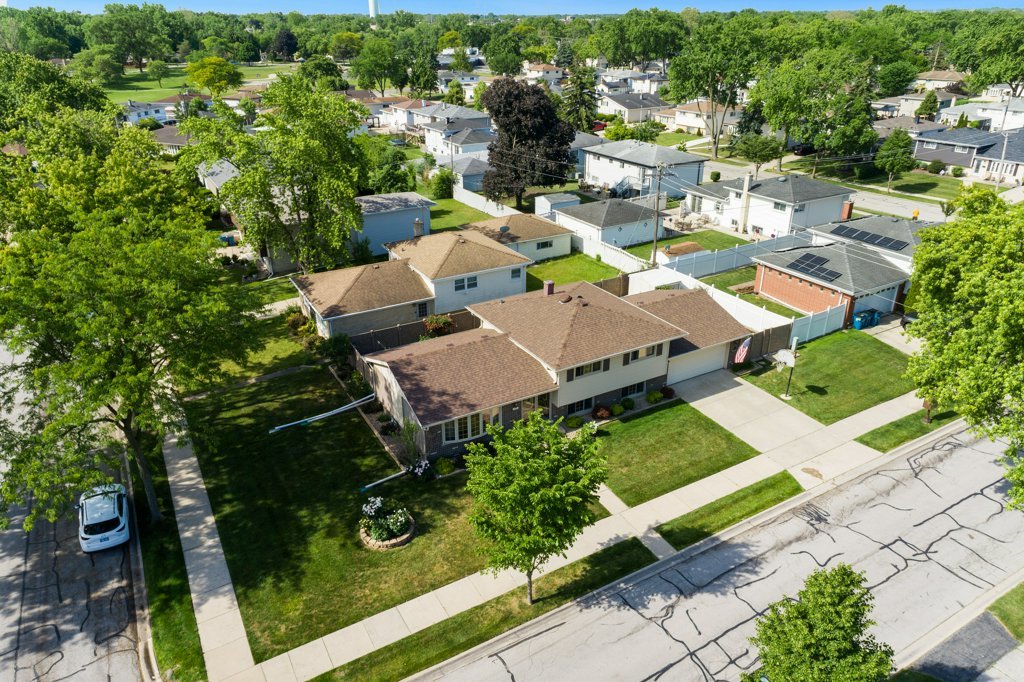 365 West Myrick Avenue Addison, IL 60101 - Photo 39 of 49 an aerial view of a house with garden space and street view